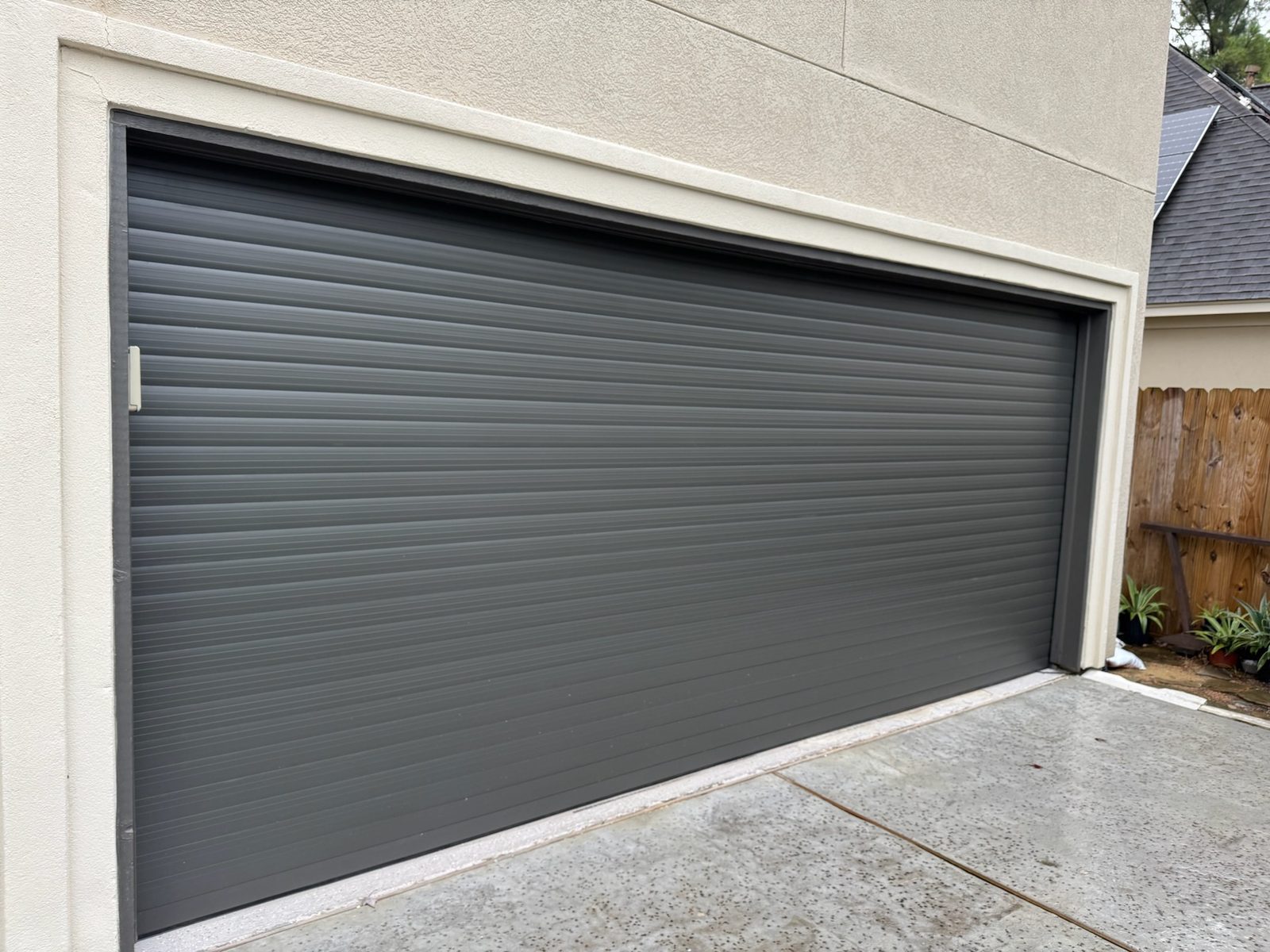 Double charcoal TMAX roll-up garage door